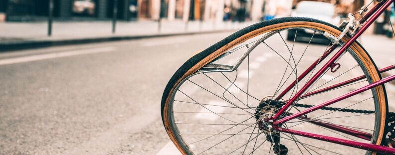 Bicycle with its front wheel damaged