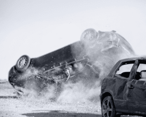 two cars turned upside-down after a car collision